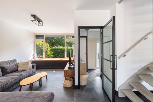 Foto - Verkocht onder voorbehoud: Instapklare tussenwoning op een rustige, autoluwe locatie!